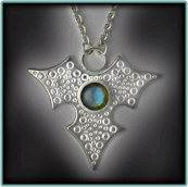 Sterling Silver Chased Triform Pendant with Labradorite Cabochon.